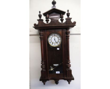 Late 19th / early 20th Century walnut cased Vienna style wall clock, the enamel dial with Roman numerals and two train moveme