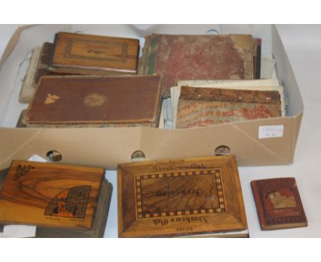 A TRAY OF ANTIQUARIAN BOOKS to include three wood covered middle eastern books, one including photographs of Palestine, Bethl