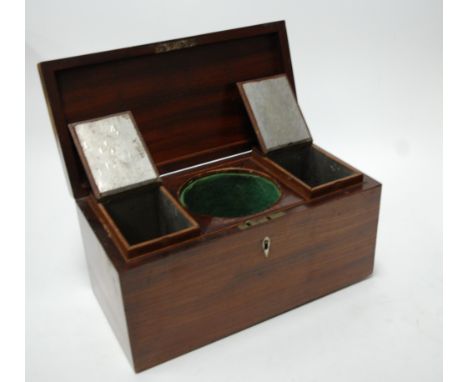 A George III mahogany tea caddy of plain rectangular form, the hinged lid revealing a fitted interior (missing mixing bowl), 