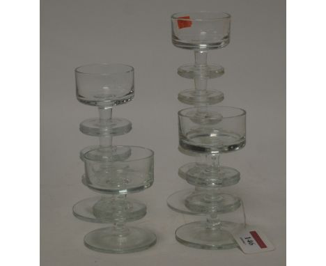 A Wedgwood clear glass candlestick designed by Ronald Stennett Wilson in the Sheringham pattern having a five ring neck on ci