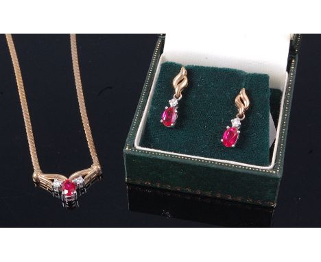 A ruby and diamond set pendant, on 9ct gold neck chain; together with a pair of 9ct gold,ruby and diamond set ear studs (2)