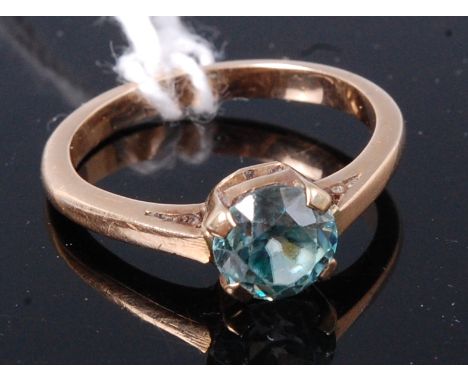 A 9ct gold and blue ***ZIRCON*** set dress ring, size K