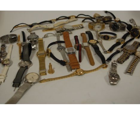 A collection of assorted ladies and gents fashion watches, to include; Christian Dior, Calvin Klein etc 