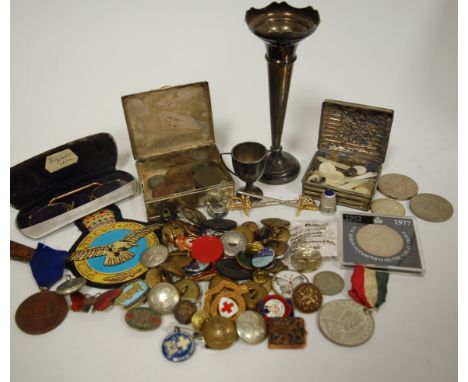 A collection of miscellaneous items to include miniature silver trophy cup, various military buttons, enamel lapel badges, si