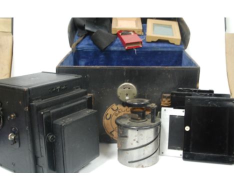 A Thornton & Pickard Special Ruby leather clad plate camera and accessories in fitted leather case