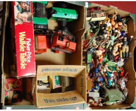 Two boxes of mixed toys to include Wrestling Action figures, Tonka tin plate tractor, collection of mixed playing cards, and 