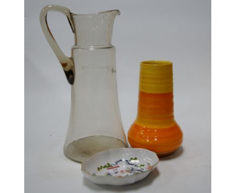 A 1930s Shelley pottery vase of ribbed form on a yellow and orange ground, together with a 1950s glass pitcher, and a Dresden