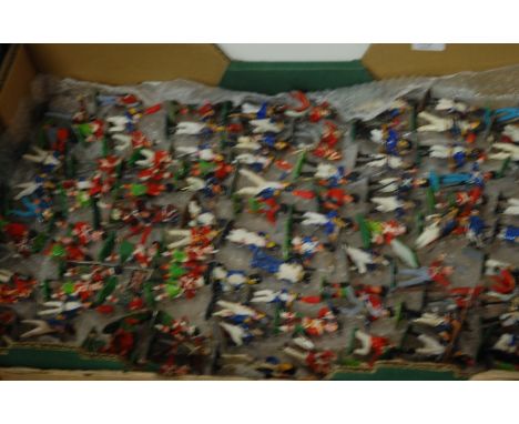 A collection of mainly plastic mixed scale Napoleonic military figures, to include; flag bearer, officers, riflemen etc 