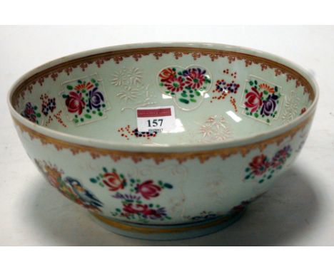 A 19th century Samson porcelain bowl, enamel decorated with floral sprays within gilt borders, dia.22cm 