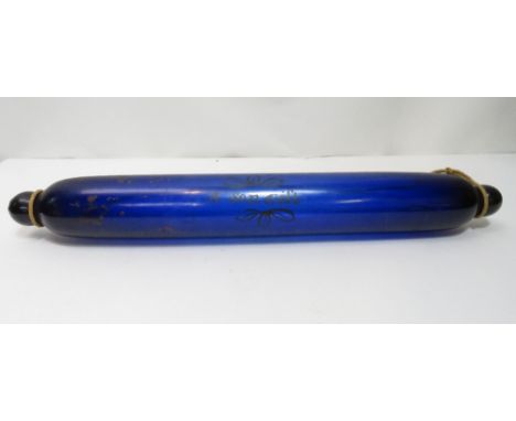 A Victorian Bristol Blue glass rolling pin inscribed A Son Gift" and with traces of other decoration  45cms long"