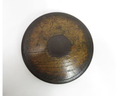Sporting interest - A vintage oak throwing discus, with an iron rim  