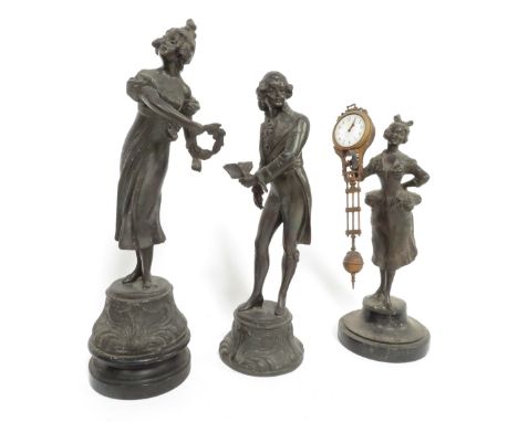 A pair of spectre figures, along with a figure with a lady holding a clock