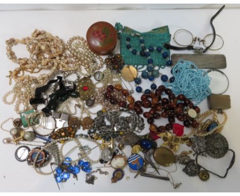 A quantity of costume jewellery, including beads; simulated pearls; a ladies wrist watch; a sphere fob watch; and a hair comb