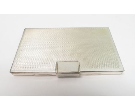 A silver hallmarked engine turned card case, hallmarked London, 74.8g gross