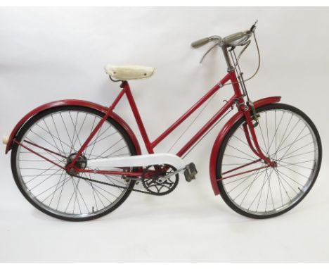 A vintage Raleigh ladies red post office bicycle