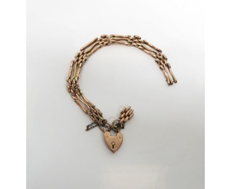 A bracelet, tagged '9c', of fancy three bar gate links, 11g gross