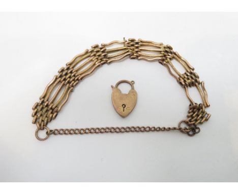 A bracelet, of five bar gate links, stamped '9c' to the end links, 19.5 g gross