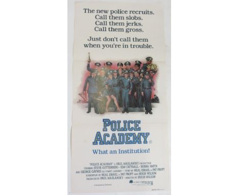 A collection of vintage film posters including Police Academy, Nightshift, Gregory's Girl and others