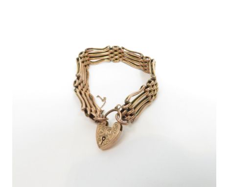 A bracelet, stamped '9ct' of fancy four bar gate link design, 16 g gross