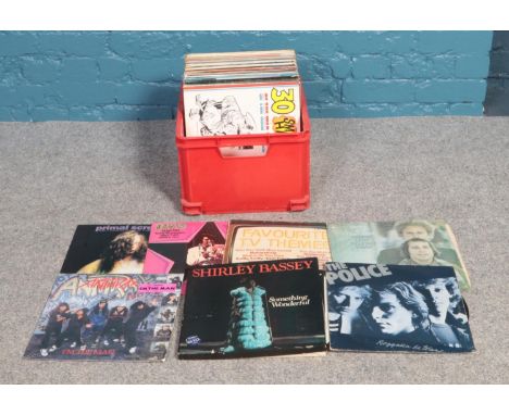 A box of assorted records; including albums from Elvis, Shirley Bassey, Diana Ross and Simon and Garfunkel.  