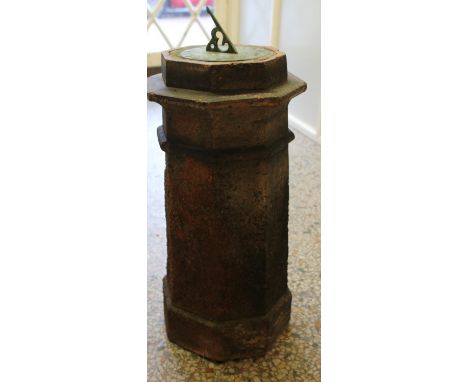 A hexagonal terracotta chimney pot sundial. Height: 80cm, Width: 34cm.  