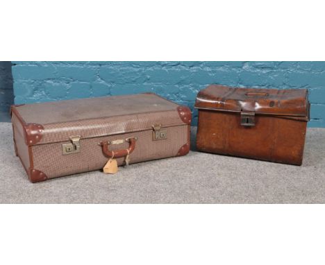 A vintage Phoenix suitcase with key, along with a small metal trunk. Trunk: H: W:43.5cm D:27cm.  Dent to the top of the metal