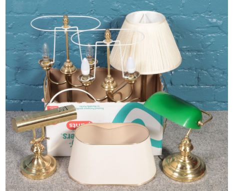 A box of table lamps. Including green glass shade desk lamp, brass examples, etc.  