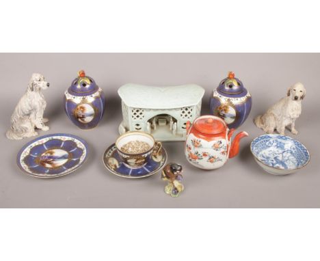 A quantity of ceramics. Including celadon centrepiece, Noritake trio and ginger jars, Border Fine Art dogs, etc.  