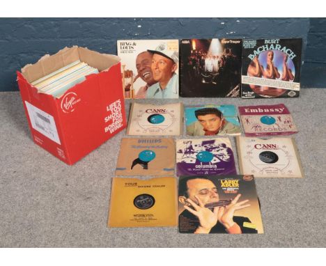 A box of assorted vinyl records. To include ABBA, Burt Bacharach, Louis Armstrong, Bing Crosby &amp; Elvis Presley on 78rpms 