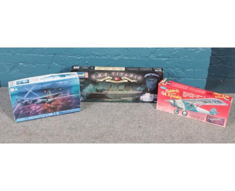 A boxed R.M.S Titanic model kit along with a Tamiya Avro Lancaster B Mk.I model kit and another example.  