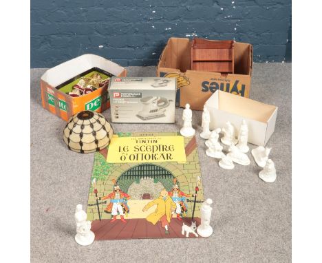 A box of miscellaneous. To include a TinTin poster 'Le Sceptre 'O' Ottokar', a Tiffany style shade, two wooden display cabine