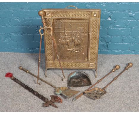 A Brass fire screen, together with companion set and decorative axe with mahogany turned handle.  