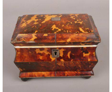 A Victorian tortoise shell tea caddy. 11cm height 14cm width.  some missing shell.