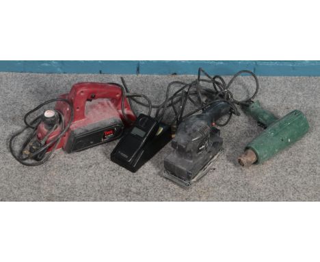 A small selection of mainly power tools. To include sander and planer, along with a Motorola International 5200 phone.  