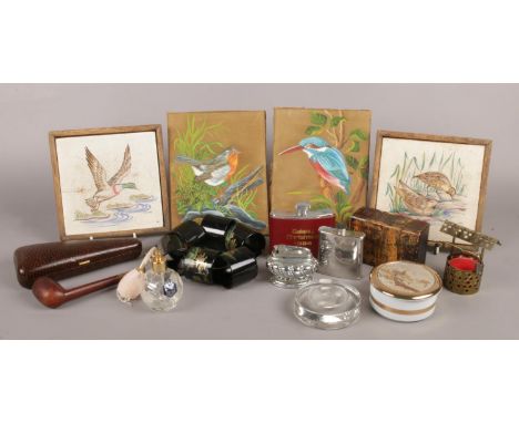 An assortment of collectable items. To include two framed ceramic tiles, two hand painted silk plaques depicting a Robin and 