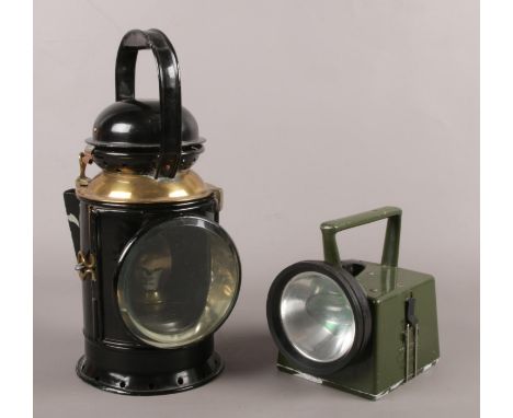 A vintage Great Western Railway lamp along with a military chloride lamp.  