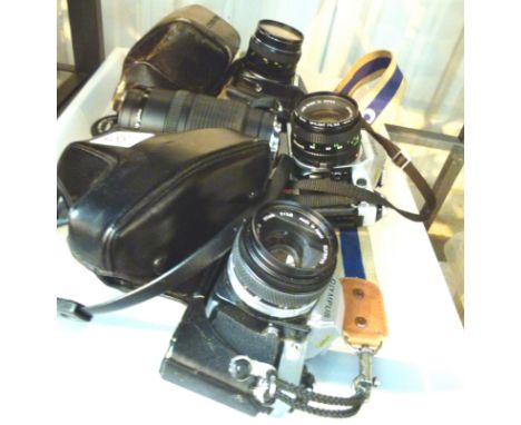 Canon AEI camera with telephoto, Olympus OM10 and Canon CM3 cameras
