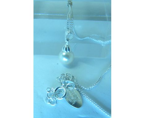 Sterling silver pearl pendant on sterling silver chain