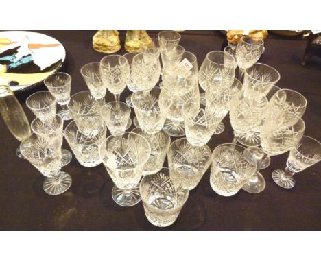 Collection of crystal drinking glasses, including brandy and wine etc