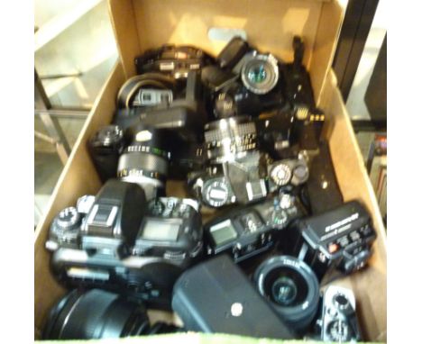 Box of camera lenses including Olympus etc 