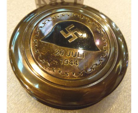Brass compass marked with swastika