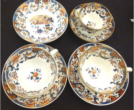 Seven early English Imari teaware pieces, comprising two large cups and one smaller cup, plus three large saucers and a small