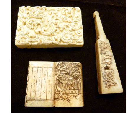 Early 20thC carved fan shaped soapstone seal, L: 9 cm with a 20thC Chinese carved book shaped soapstone seal, L: 5 x 4 cm and