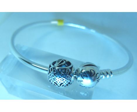 Sterling silver genuine Pandora bangle and genuine Pandora charm