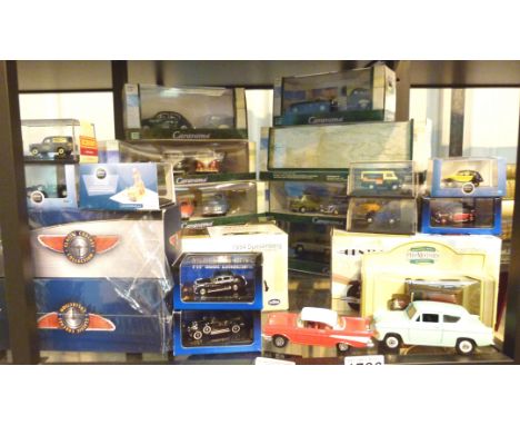 Shelf of diecast vehicles, mainly boxed, to include eight Cararamas and others