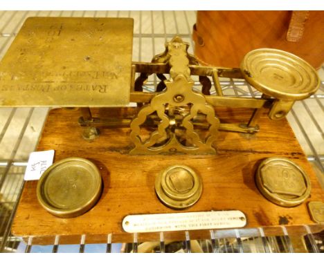 Set of antique postal scales with weights