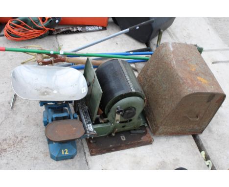 A VINTAGE SET OF BALANCE SCALES AND A VINTAGE PRINTING MACHINE