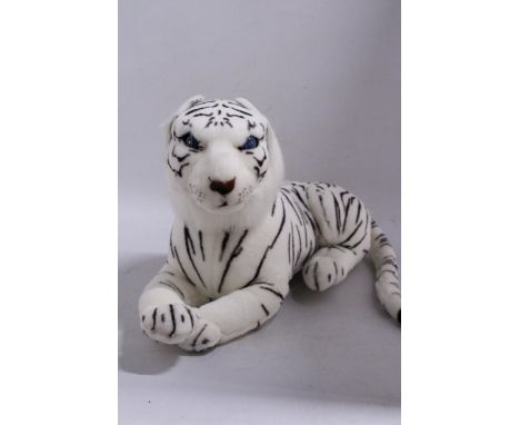A PLUSH WHITE TIGER TOY, GROWLS AND EYES LIGHT UP