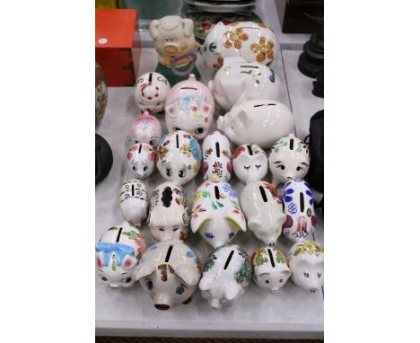 TWENTY TWO VINTAGE CERAMIC PIGGY BANKS