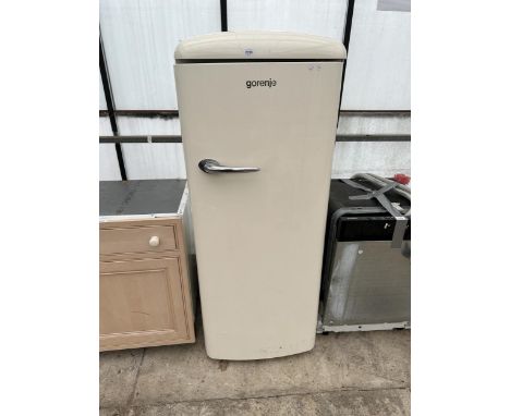 A CREAM GORENJE UPRIGHT FRIDGE (DOOR BROKEN)